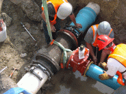 Broad River Water Plant Crew Digging Putting a Pipe Together